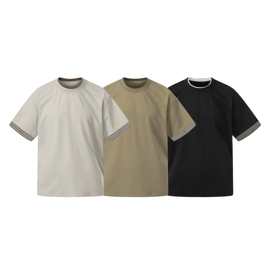 Three crew-neck T-shirts shown together in light beige, olive-brown and black, each with checked sleeve cuffs.