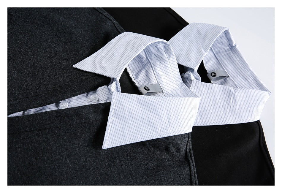 Close-up of white pinstriped collars and button plackets on black and charcoal tops.