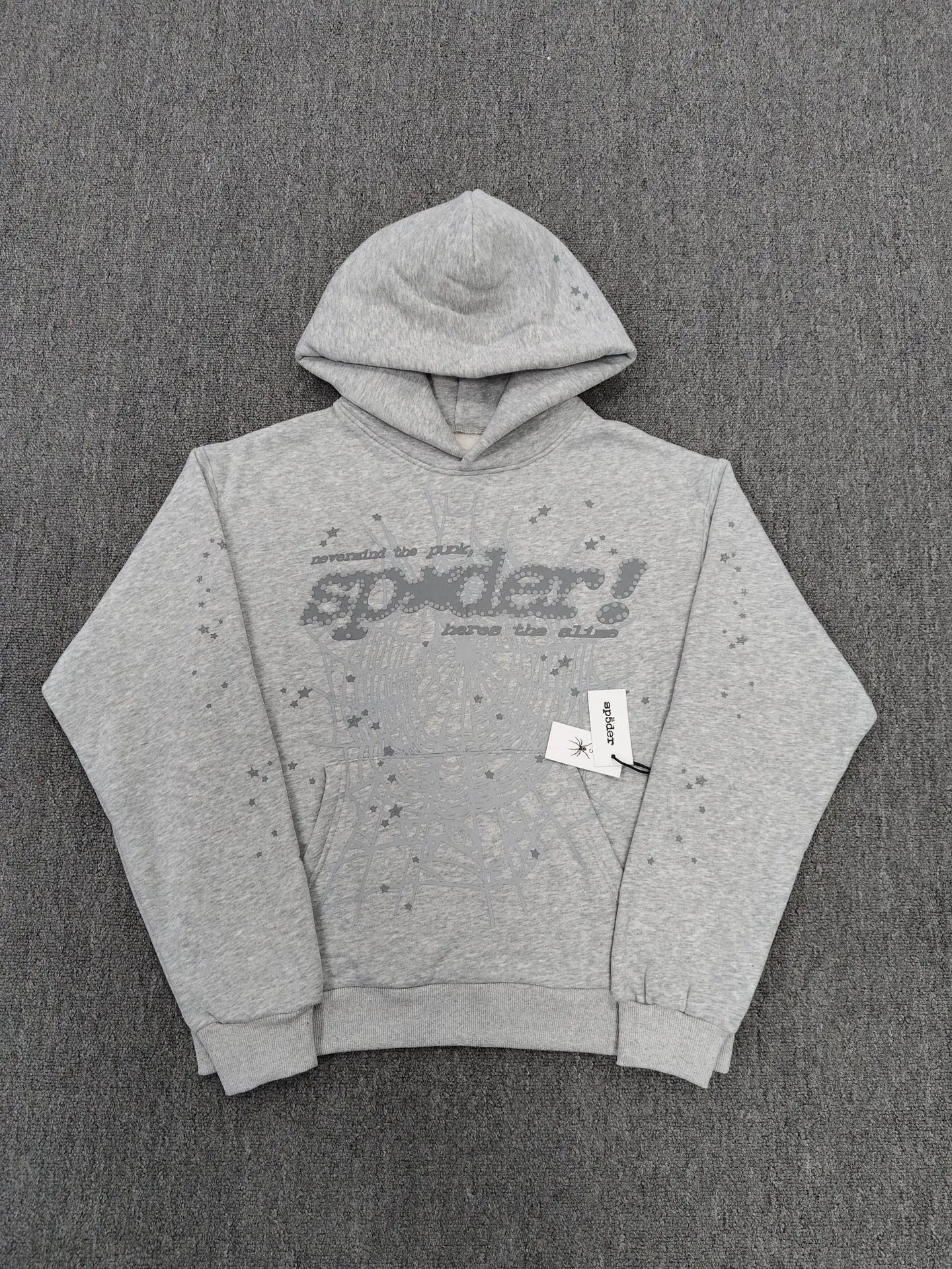 Grey Sp5der pullover hoodie with spider web graphic and star print detailing on chest and sleeves