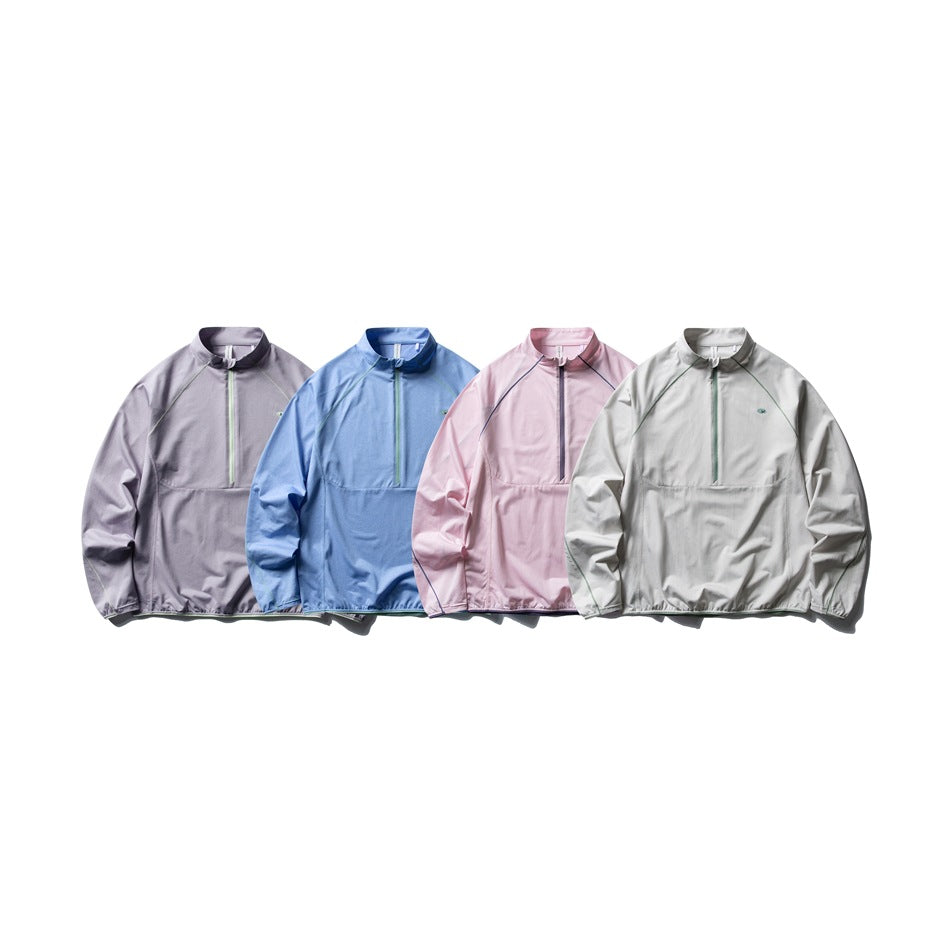 Four quarter-zip pullovers displayed together in lavender, blue, pink and light gray.