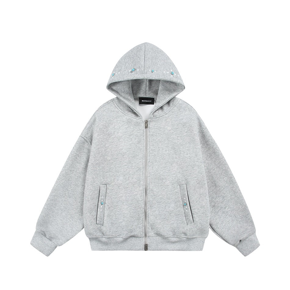 Heather gray zip-up hoodie flat lay with turquoise and white beads on the hood edge and pocket openings