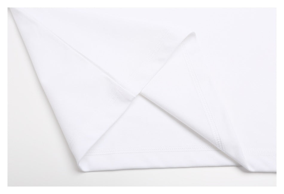 Close-up of the white T-shirt's inside seams and stitching.
