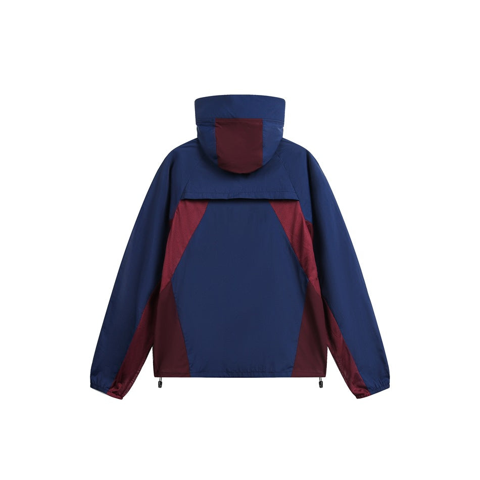 Back view of a navy hooded jacket with burgundy and red mesh color-block panels.