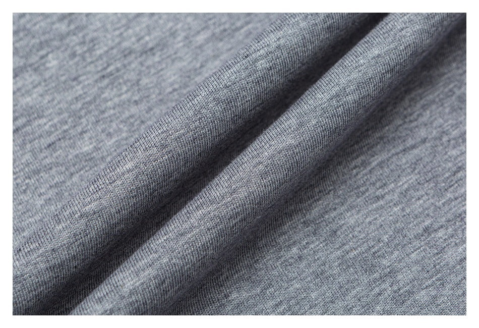 Close-up showing the heather gray knit texture and soft folds of the fabric.