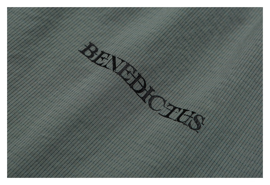 Black BENEDICTUS lettering on the finely striped blue-gray garment.