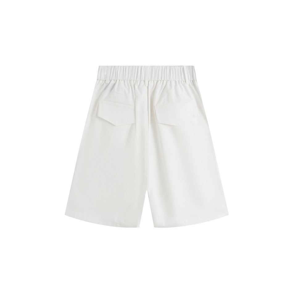 White shorts back view with elastic waistband and two flap pockets