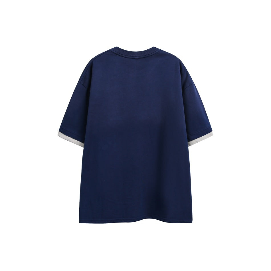 Back view of a plain navy T-shirt with short sleeves and light contrasting trim at the sleeve edges.