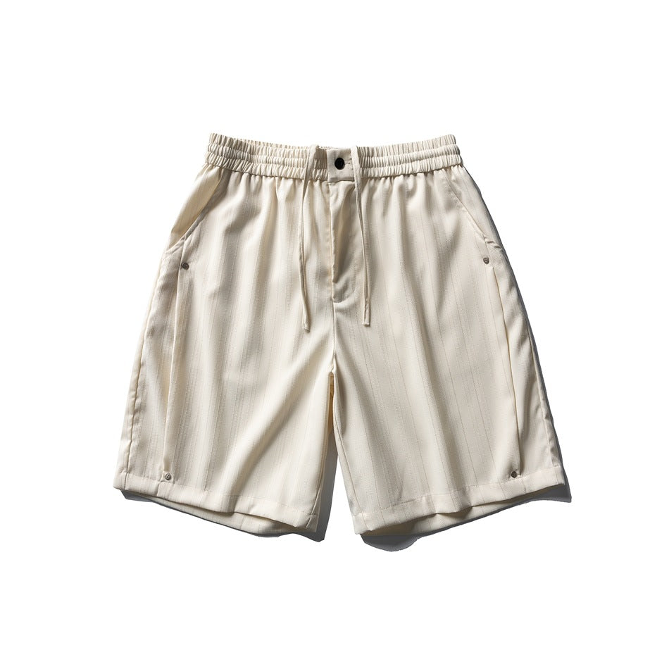 Off-white striped knee-length shorts with elastic drawstring waist, front button and side studs, flat lay