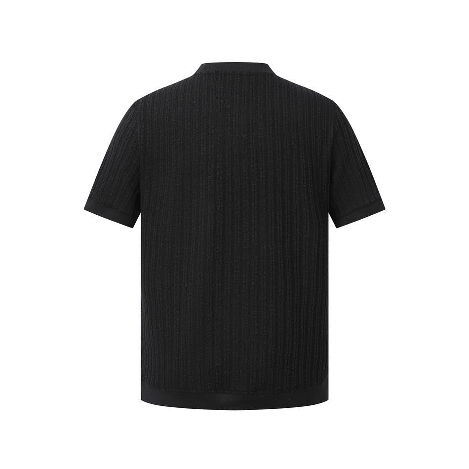 Back view of a black short-sleeve shirt with vertical ribbing and a plain crew neckline.