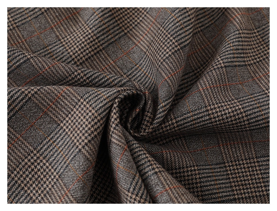 Close-up of the brown-gray plaid fabric with fine houndstooth checks and thin rust-colored lines.