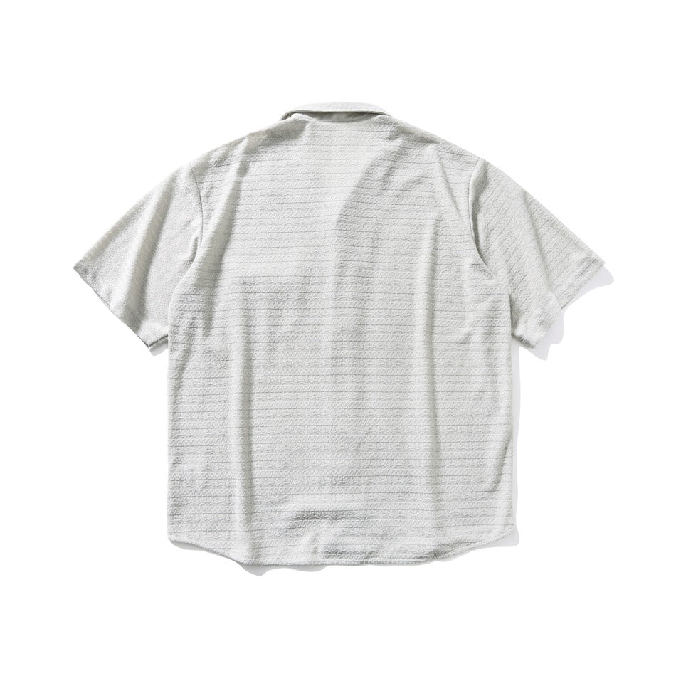 Back view of a light gray short-sleeve collared shirt with a subtle horizontal textured pattern.