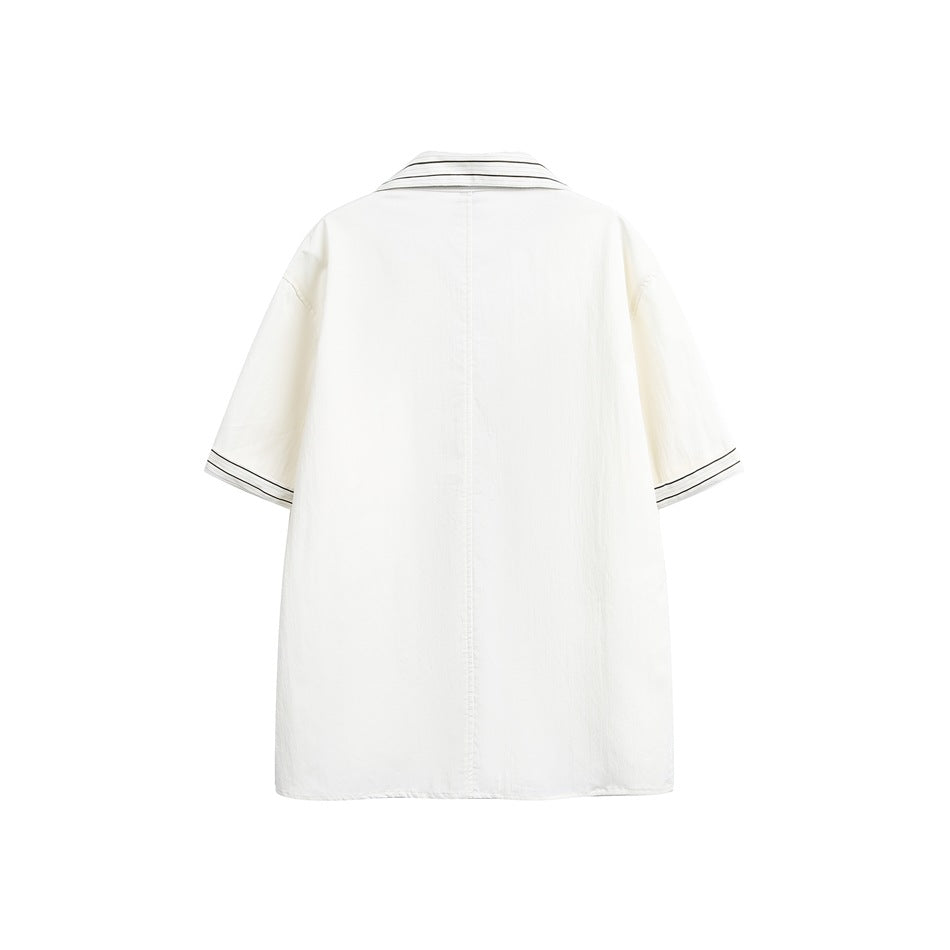 Back view of a white short-sleeve shirt with a dark striped collar and sleeve cuffs.