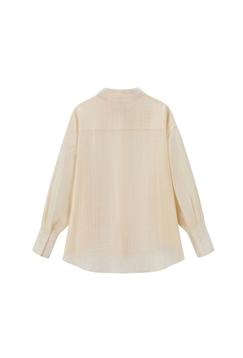 Back view of a light yellow-apricot button-up shirt with back yoke, buttoned cuffs and curved hem