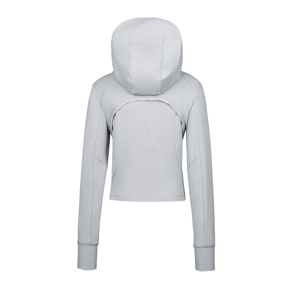 Back view of light gray cropped hooded jacket with curved back yoke seam, paneled hood and long sleeves