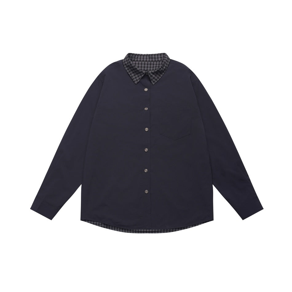 Navy button-front long-sleeve shirt with gray-black check collar, hem lining and chest pocket, flat lay