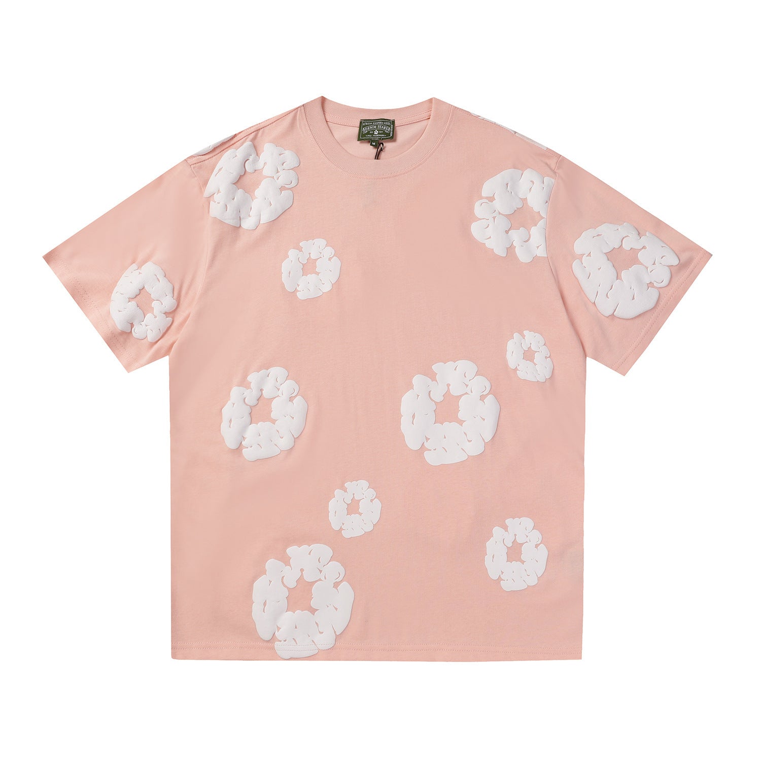 Pink Denim Tears T-shirt with all-over white wreath print, crew neck, short sleeves, flat lay view