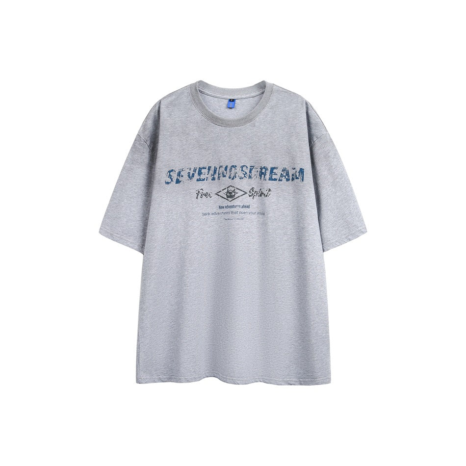 Gray short-sleeve crewneck T-shirt flat lay with blue distressed lettering and diamond emblem print on the chest