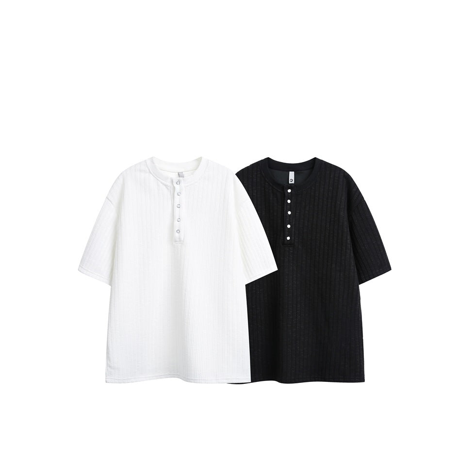 White and black ribbed short-sleeve henley shirts displayed side by side.
