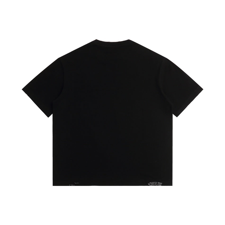 Back view of a plain black short-sleeve crew-neck T-shirt, with small white text near the hem.