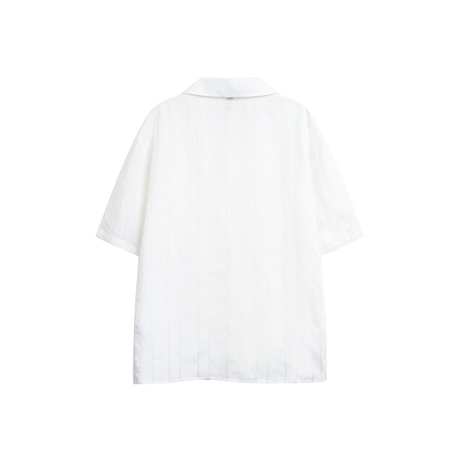 Back view of a white short-sleeve collared shirt with subtle vertical texture.