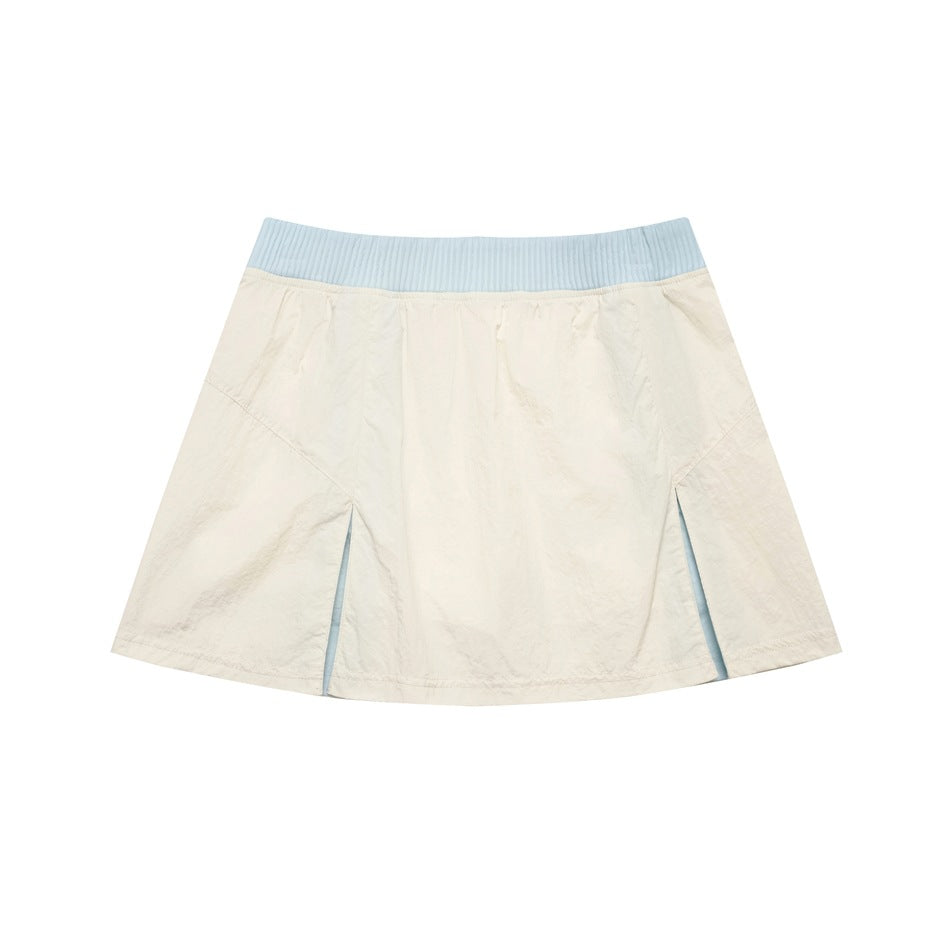 Off-white A-line mini skirt with light blue ribbed waistband and front vent slits with blue inserts, flat lay