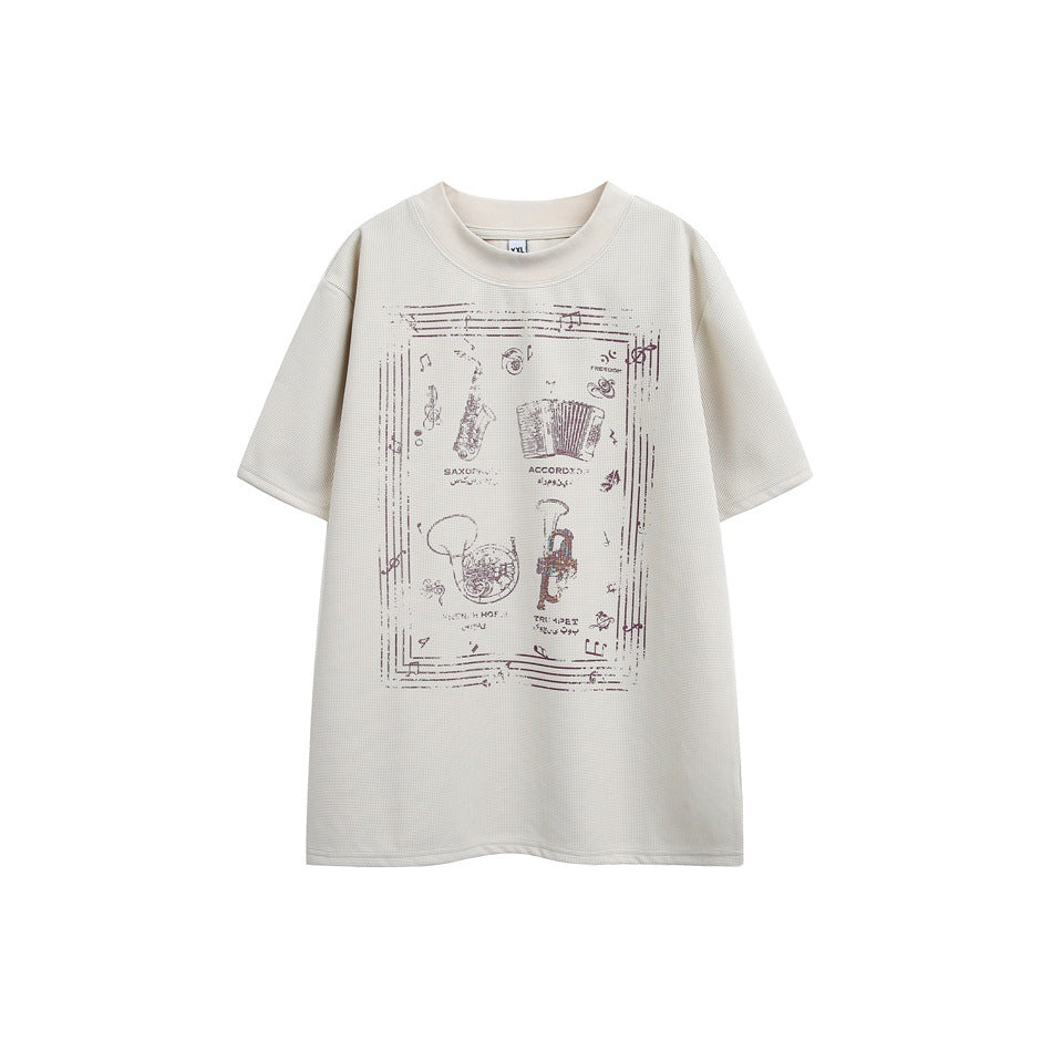 Beige waffle-knit short-sleeve T-shirt with plum musical instrument graphic on the chest, flat front view