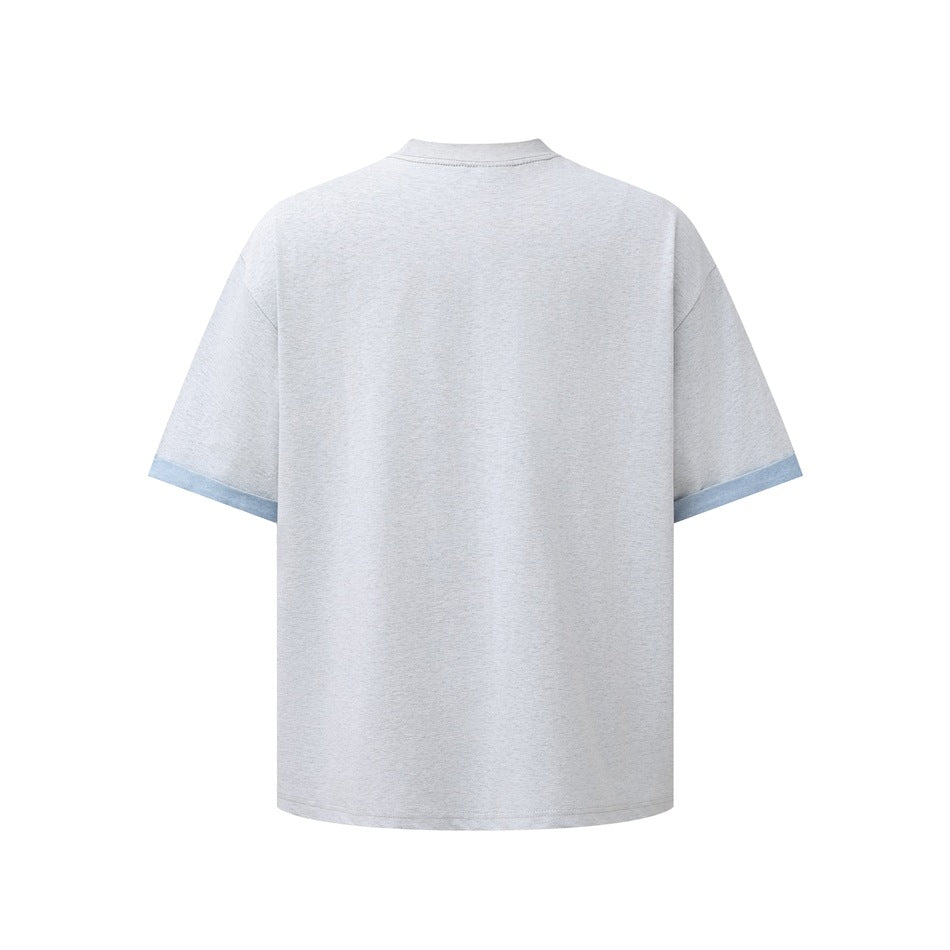 Back view of a light gray T-shirt with pale blue sleeve cuffs.