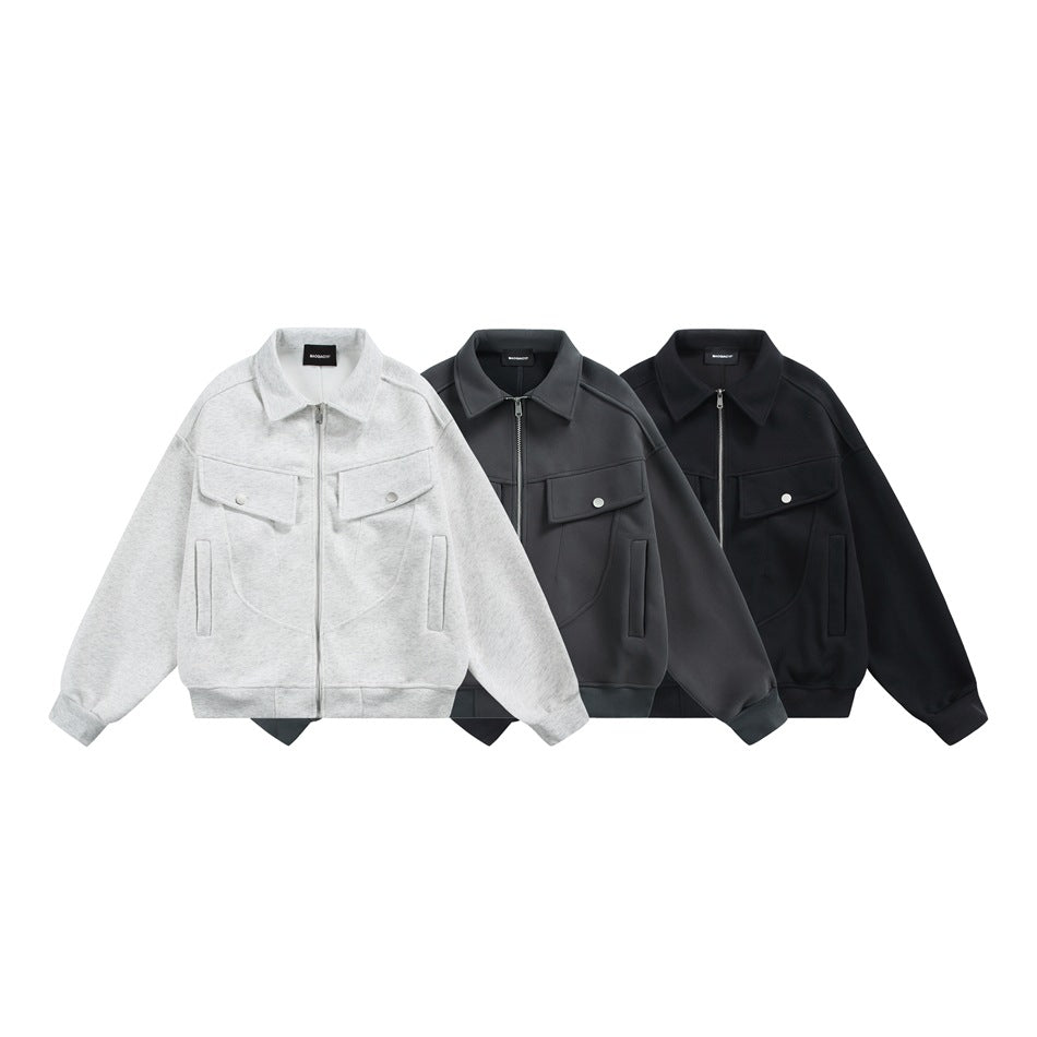 Three zip-front jackets shown from the front in light gray, charcoal gray, and black.