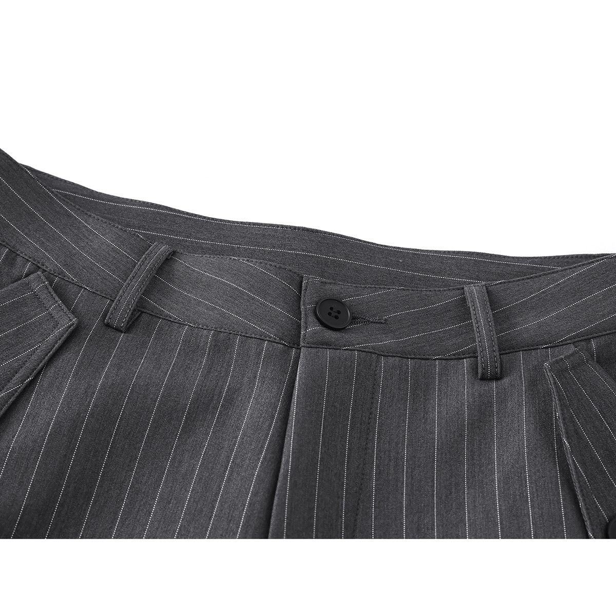 Close-up of charcoal gray pinstripe trousers showing the waistband, belt loops, button, and pleats.
