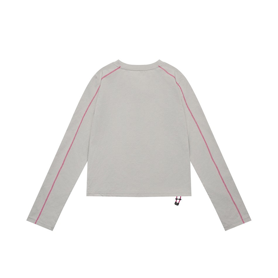 Back view of a light gray long-sleeve top with pink raglan seam stitching and a hem drawcord toggle.