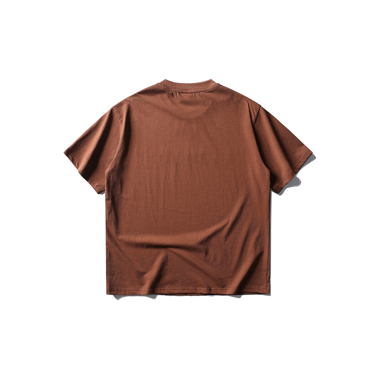 Back view of brick-red short-sleeve crew-neck T-shirt with plain back and dropped shoulders