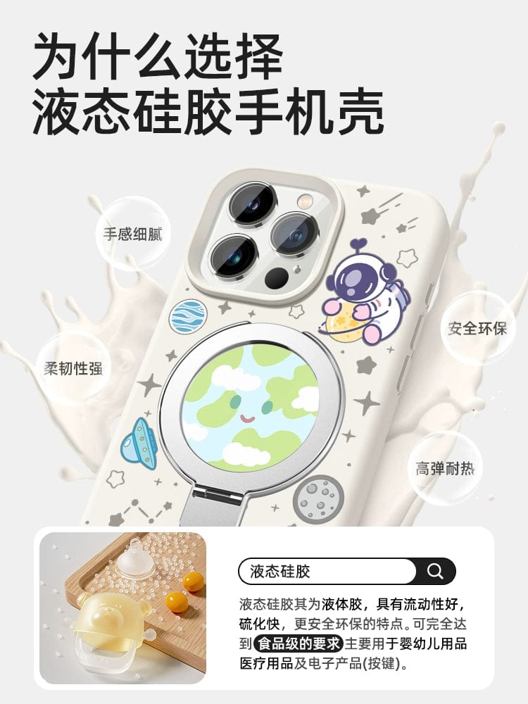 An iPhone 16 Pro Max in a Pink Silicone MagSafe Case with Stand, featuring a space theme complete with planets and stars, rests in an open beige box with an additional slot for another phone or accessory.