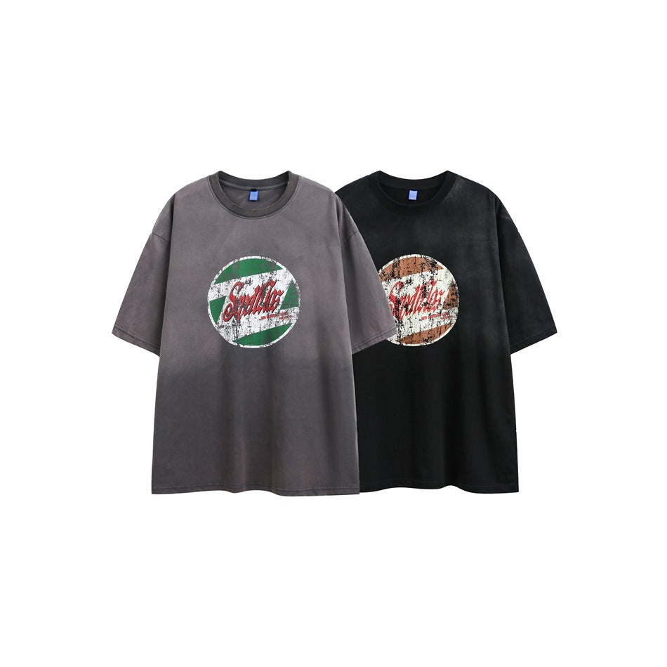 Front view of charcoal gray and black oversized T-shirts with distressed circular chest graphics.