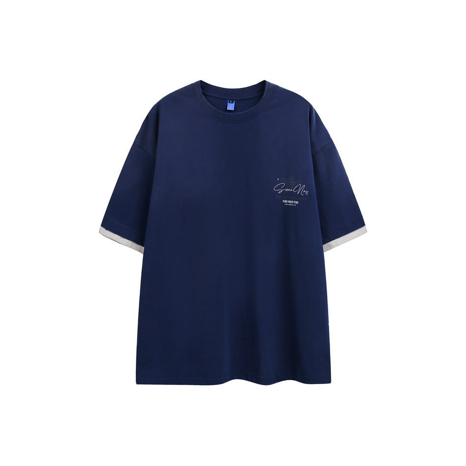 Navy blue short-sleeve crew-neck T-shirt with small left chest print and light gray layered sleeve hems, front flat view