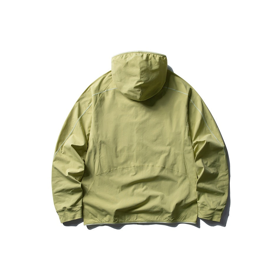 Back view of a yellow-green hooded jacket with pale contrast piping and long sleeves, laid flat on white.