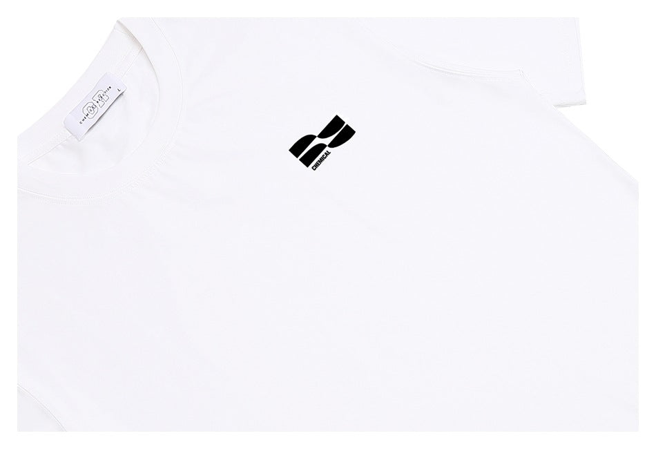 Close-up of a white T-shirt front with a small black chest logo and crew neckline.
