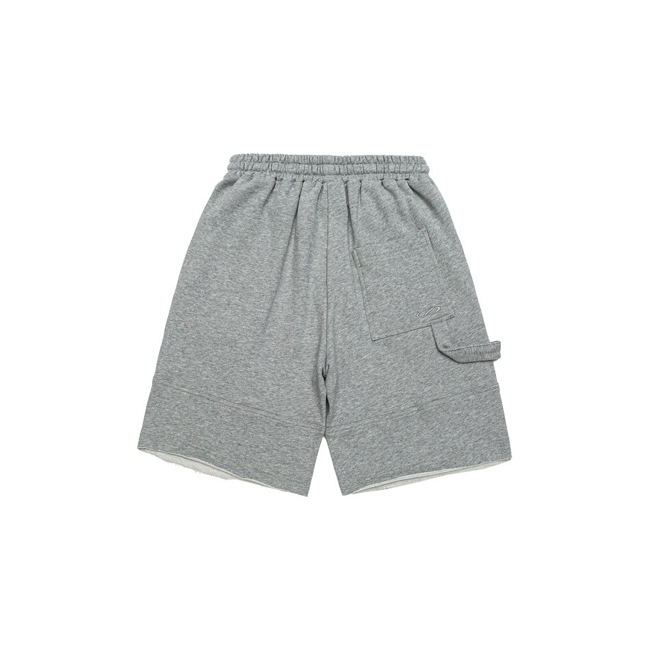 Heather gray knee-length shorts back view with elastic waistband, patch pocket and raw hems