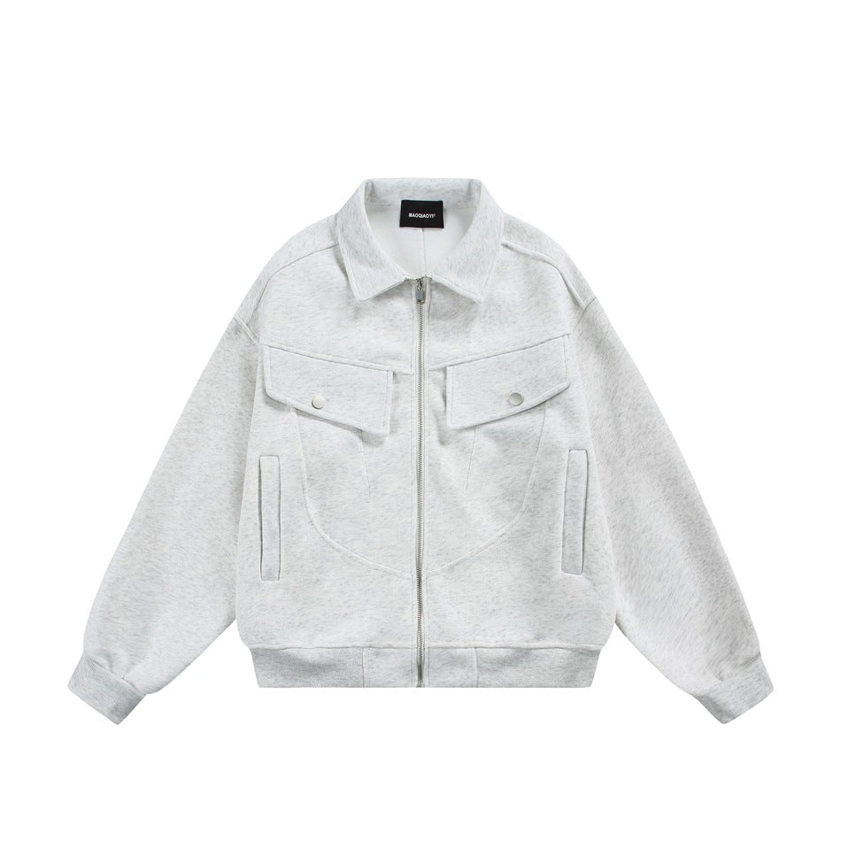 Light heather gray zip-front jacket with collar, chest flap pockets and ribbed cuffs and hem, flat lay