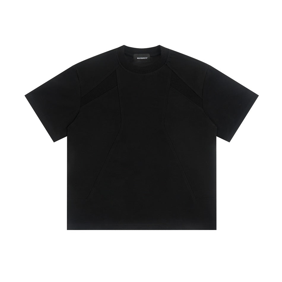 Black short-sleeve crewneck T-shirt flat lay with curved front seams and diagonal ribbed shoulder panels