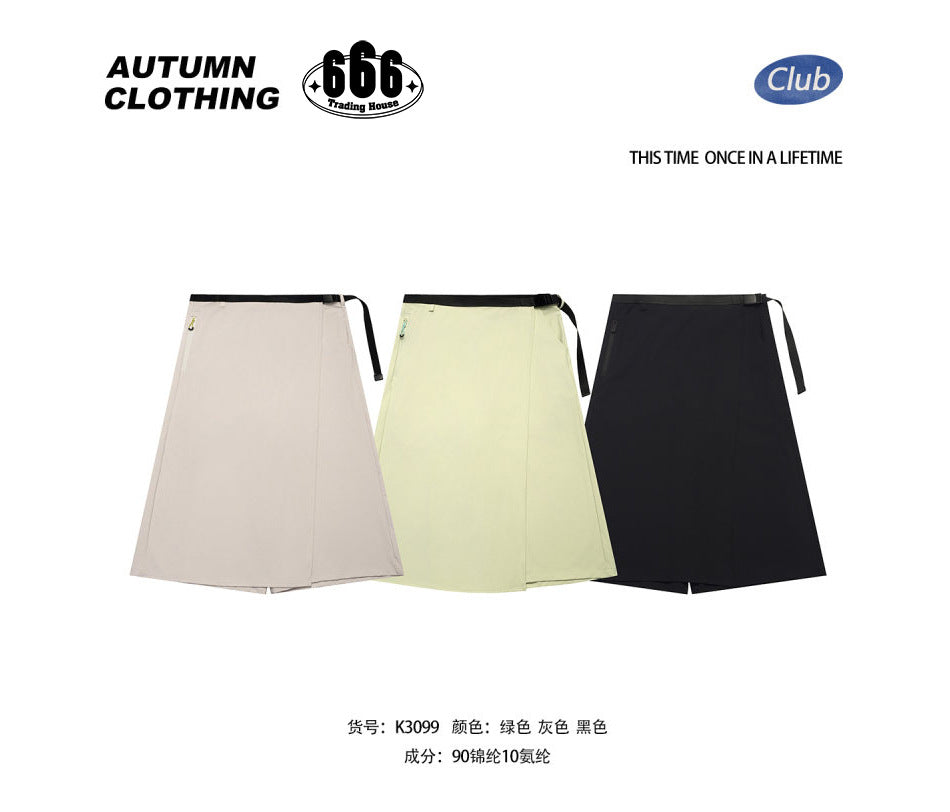 Three wrap-style midi skirts in light gray, pale green and black with black belts, with fabric content text