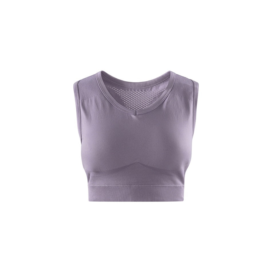 Dusty purple-pink sleeveless cropped sports top, front view, with a V seam at the neckline and a ribbed hem band