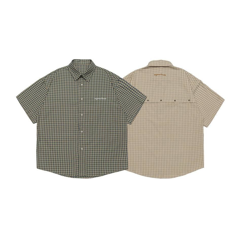 Front of a dark teal plaid short-sleeve button-up beside the back of a light beige plaid shirt.