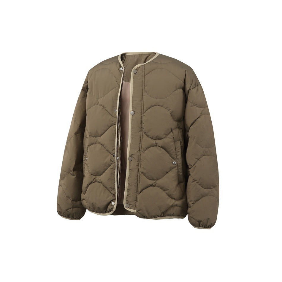 Front view of a taupe quilted jacket with a round neckline, snap closure, contrast edging, and side pockets.