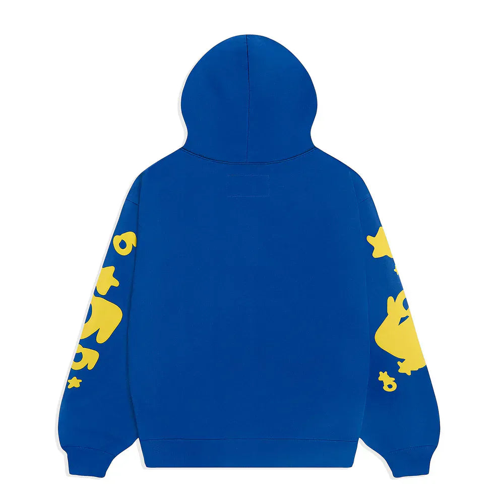 The Sp5der 440GSM Heavyweight Hoodie in royal blue features bold yellow star 3D puff prints on both sleeves—a striking Y2K streetwear statement, shown from the back with the hood up.
