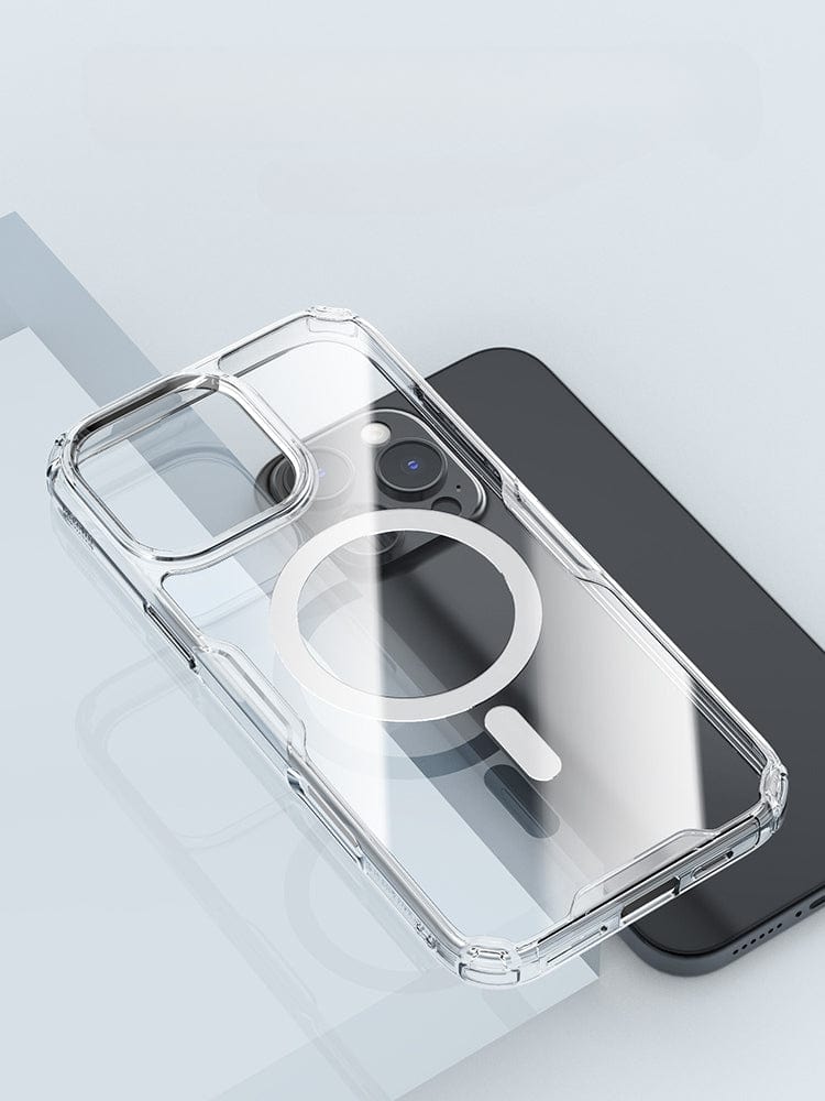 The Clear Magnetic iPhone 16 Pro Max Case, featuring a circular MagSafe design on a gray smartphone, is placed on a reflective surface. This crystal-clear case offers shockproof protection while maintaining the sleek look of your device.