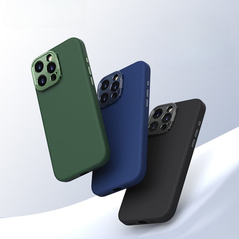 Three iPhone 16 Pro Max smartphones are arranged in a floating, angled position against a soft gradient background, each featuring their backs visible and covered in protective cases available in green, blue, and black. These MagSafe-compatible cases are made from eco-friendly liquid silicone and come with a silicone grip along with an aluminum camera kickstand.