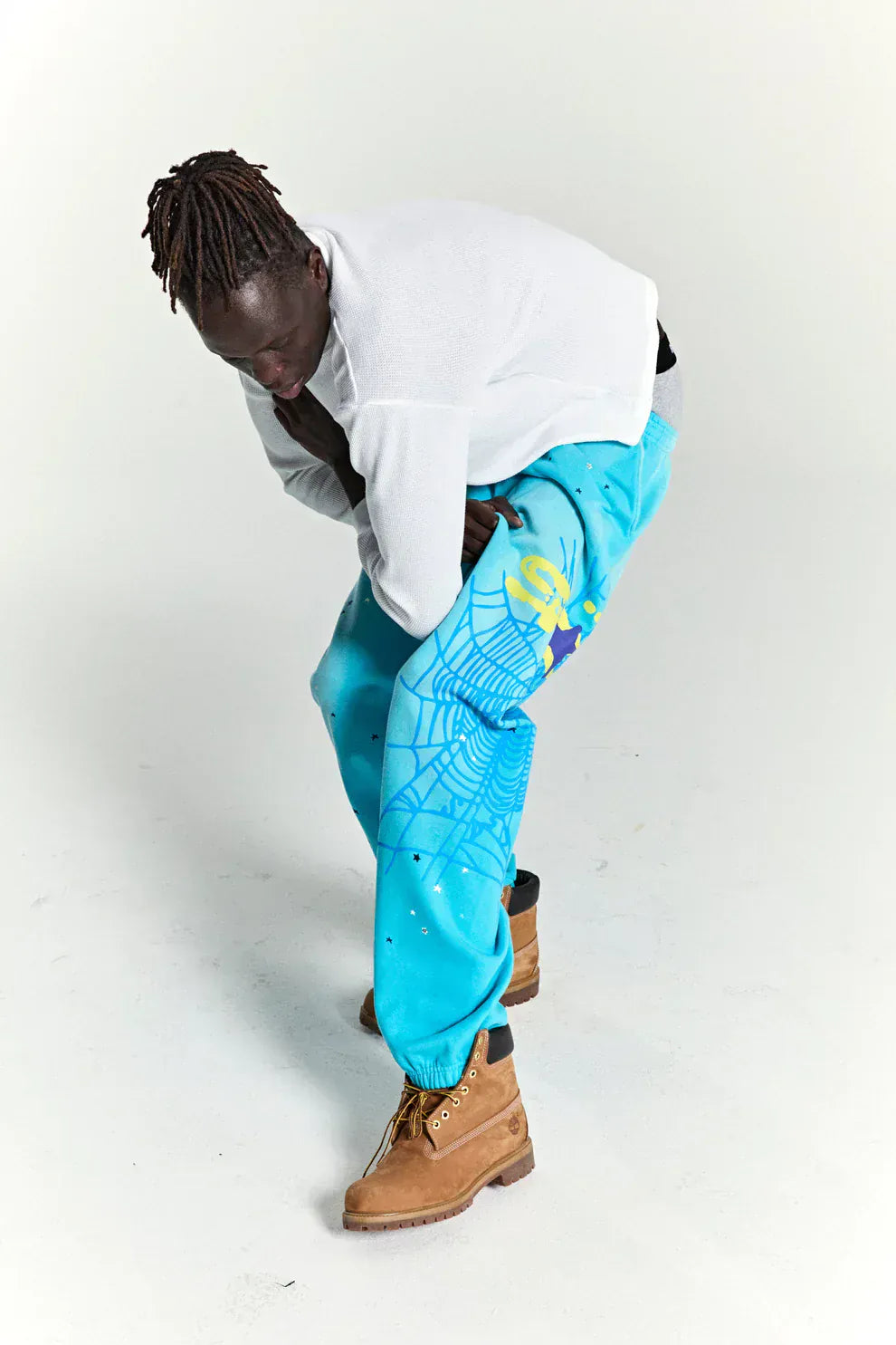 100% Cotton Sp5der Sweatpants – Unisex Blue Jogger Pants with Spider Web Graphic and Star Details, Relaxed Fit