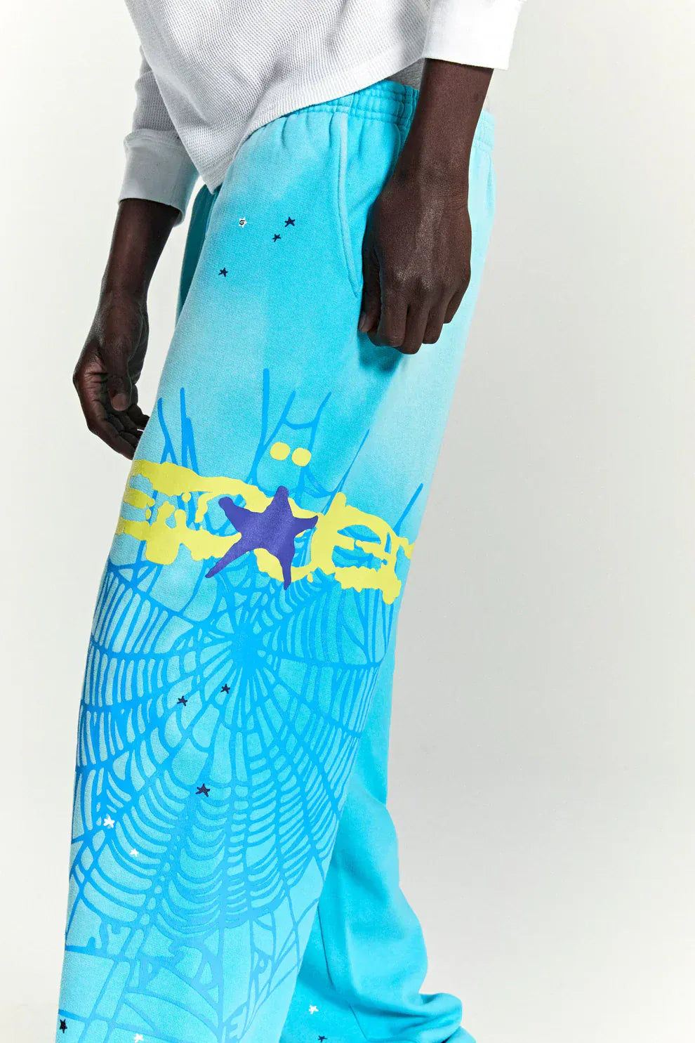 100% Cotton Sp5der Sweatpants – Unisex Blue Jogger Pants with Spider Web Graphic and Star Details, Relaxed Fit