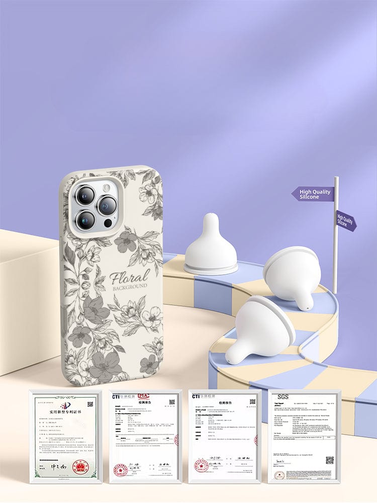 Displayed on a platform is a smartphone encased in an iPhone 16 Pro Max Floral Silicone Protective Cover, featuring a shockproof triple-layer design and anti-fingerprint coating. It is accompanied by silicone baby bottle nipples. Certificates are displayed at the bottom, all set against a purple backdrop with a "High Quality Silicone" sign, ensuring 360° protection.