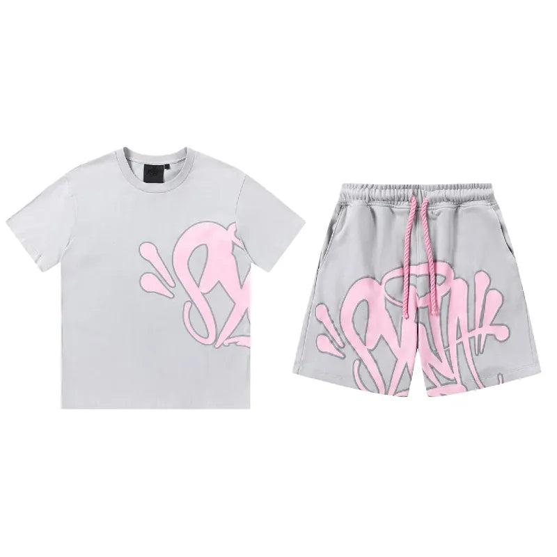 A light gray Syna World T-Shirt and Shorts Set with Accessories, featuring bold pink graffiti-style lettering—a standout streetwear outfit available in 8 colors from Syna World clothing.